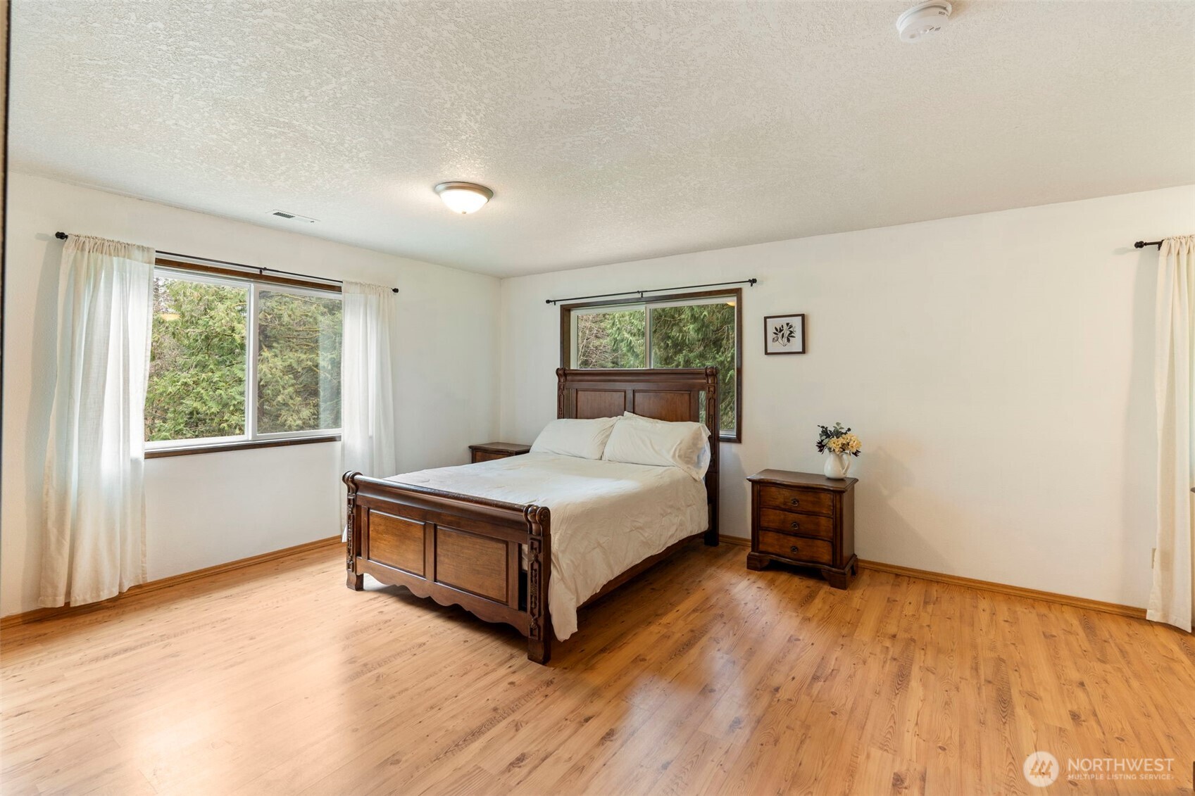 209 Alpha Way Onalaska, WA 98570 - Photo 19 of 40 a bed room with a bed and a window