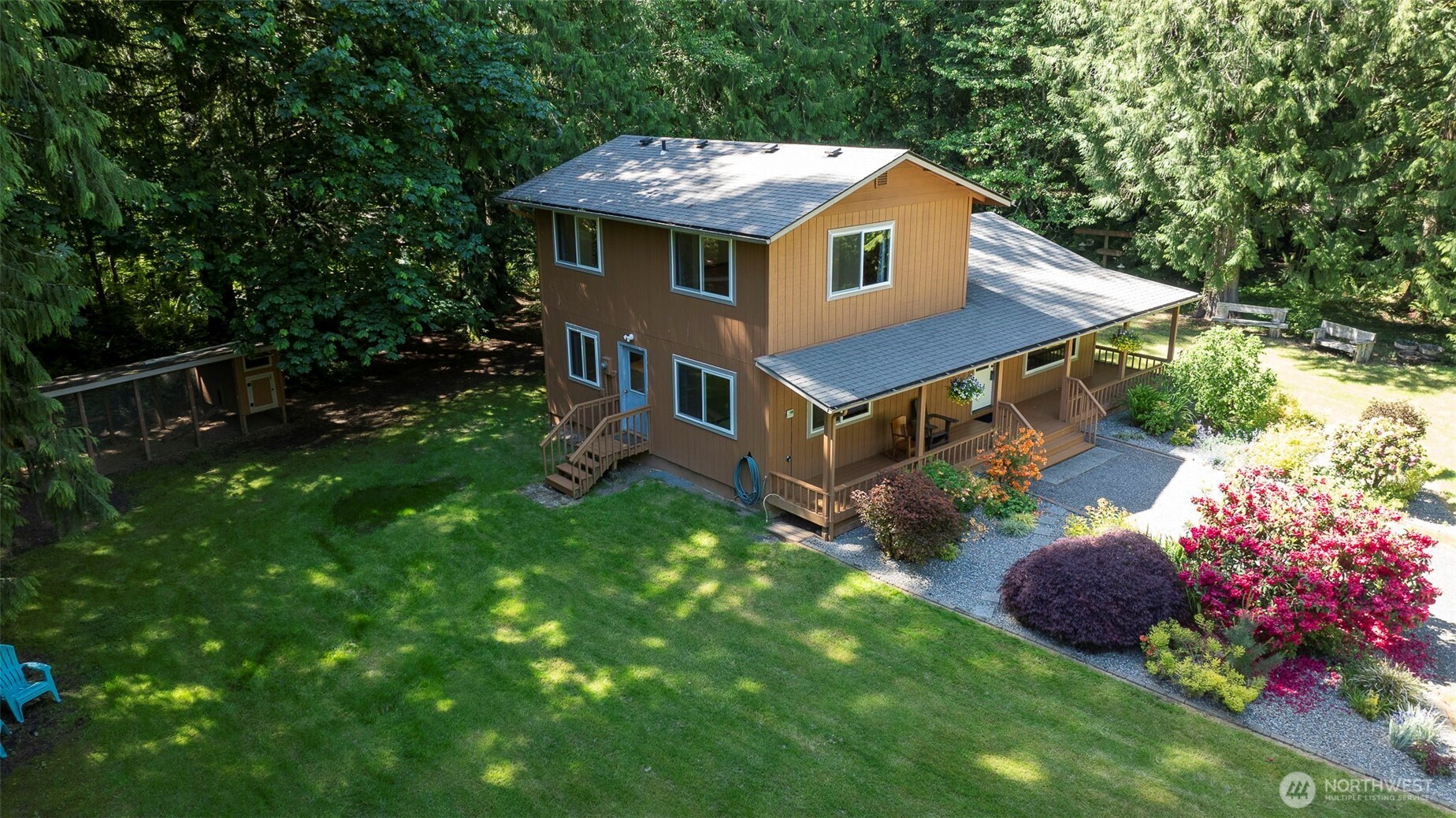 209 Alpha Way Onalaska, WA 98570 - Photo 25 of 40 a aerial view of a house with a yard balcony and swing