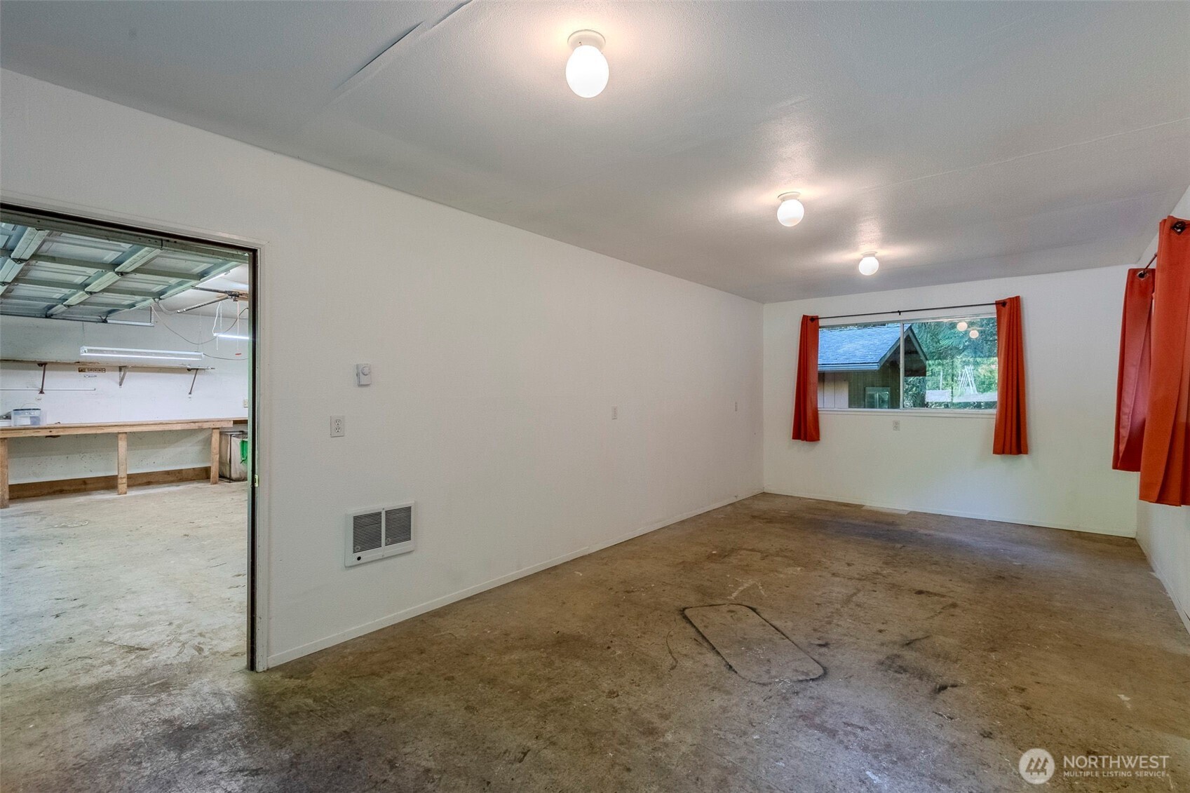 209 Alpha Way Onalaska, WA 98570 - Photo 32 of 40 an empty room with windows