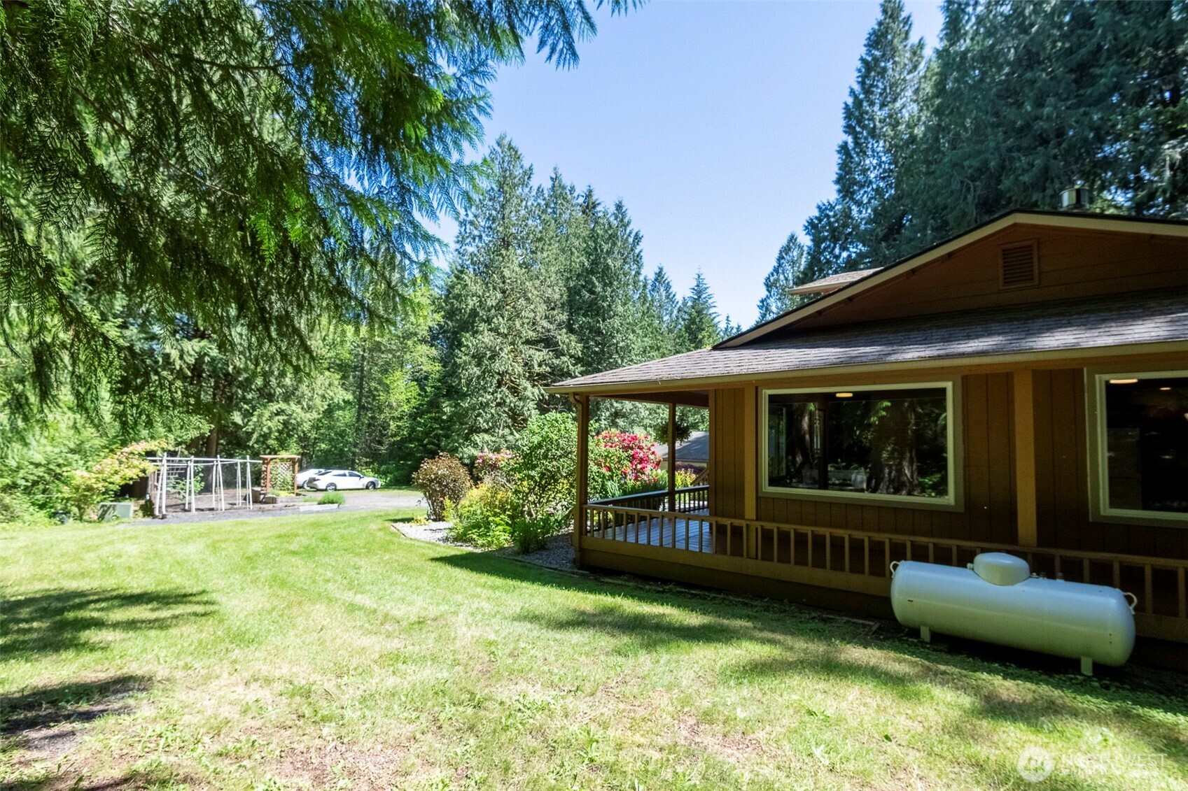 209 Alpha Way Onalaska, WA 98570 - Photo 4 of 40 a view of a house with backyard and porch
