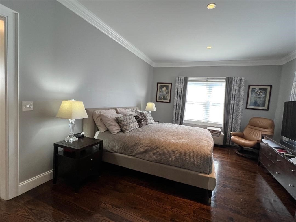 6 East Commons Drive, Unit 6 Hadley, MA 01035 - Photo 14 of 27 a bedroom with bed and window