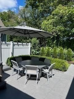 6 East Commons Drive, Unit 6 Hadley, MA 01035 - Photo 17 of 27 a view of a outdoor space with a patio