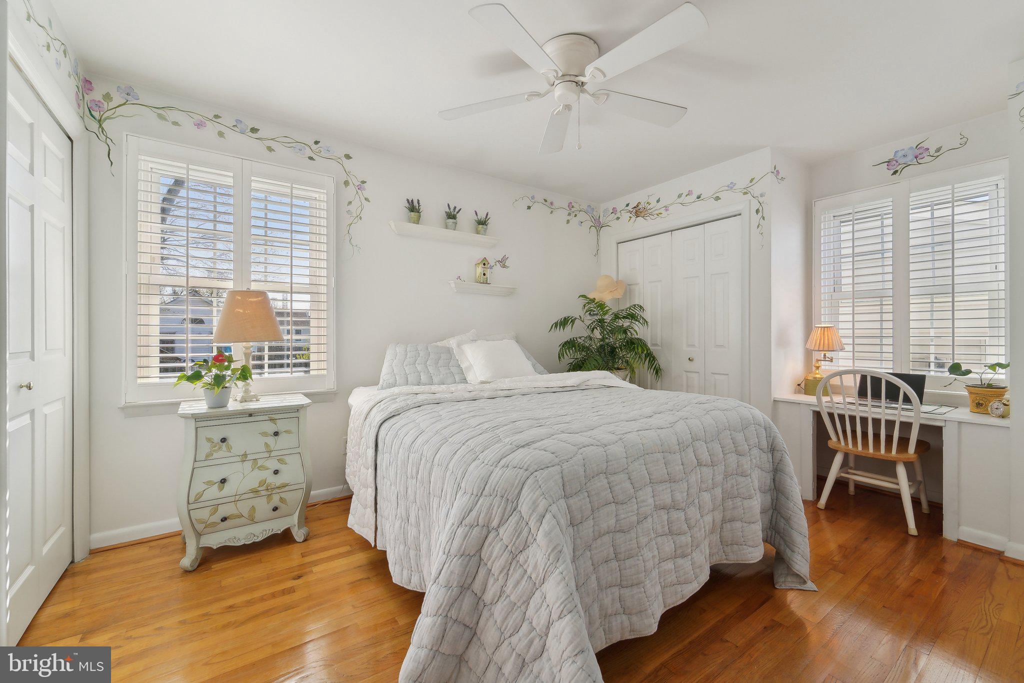 901 Mark Road Baltimore, MD 21225 - Photo 13 of 39 a bedroom with a bed and a chandelier