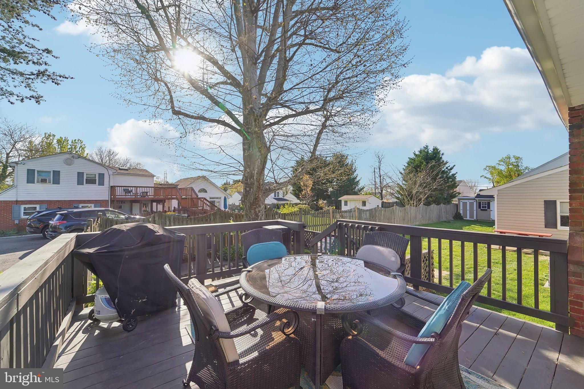 901 Mark Road Baltimore, MD 21225 - Photo 27 of 39 a view of a chairs and table on the roof deck