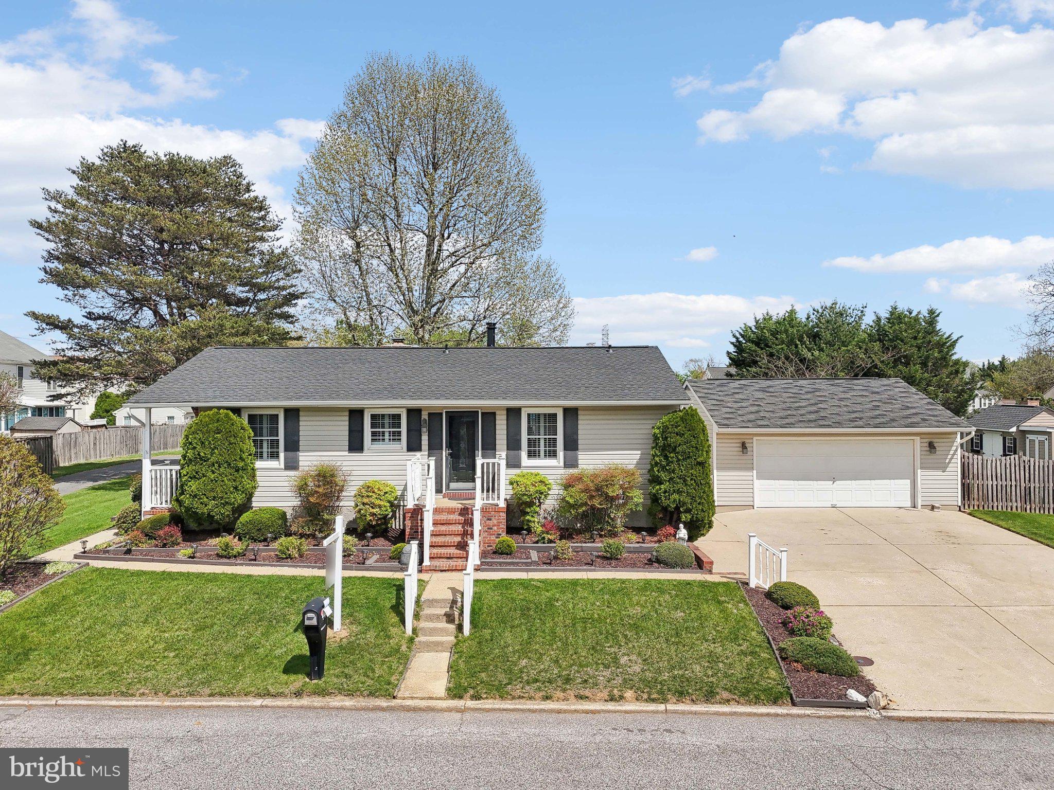 901 Mark Road Baltimore, MD 21225 - Photo 31 of 39 a front view of a house with garden