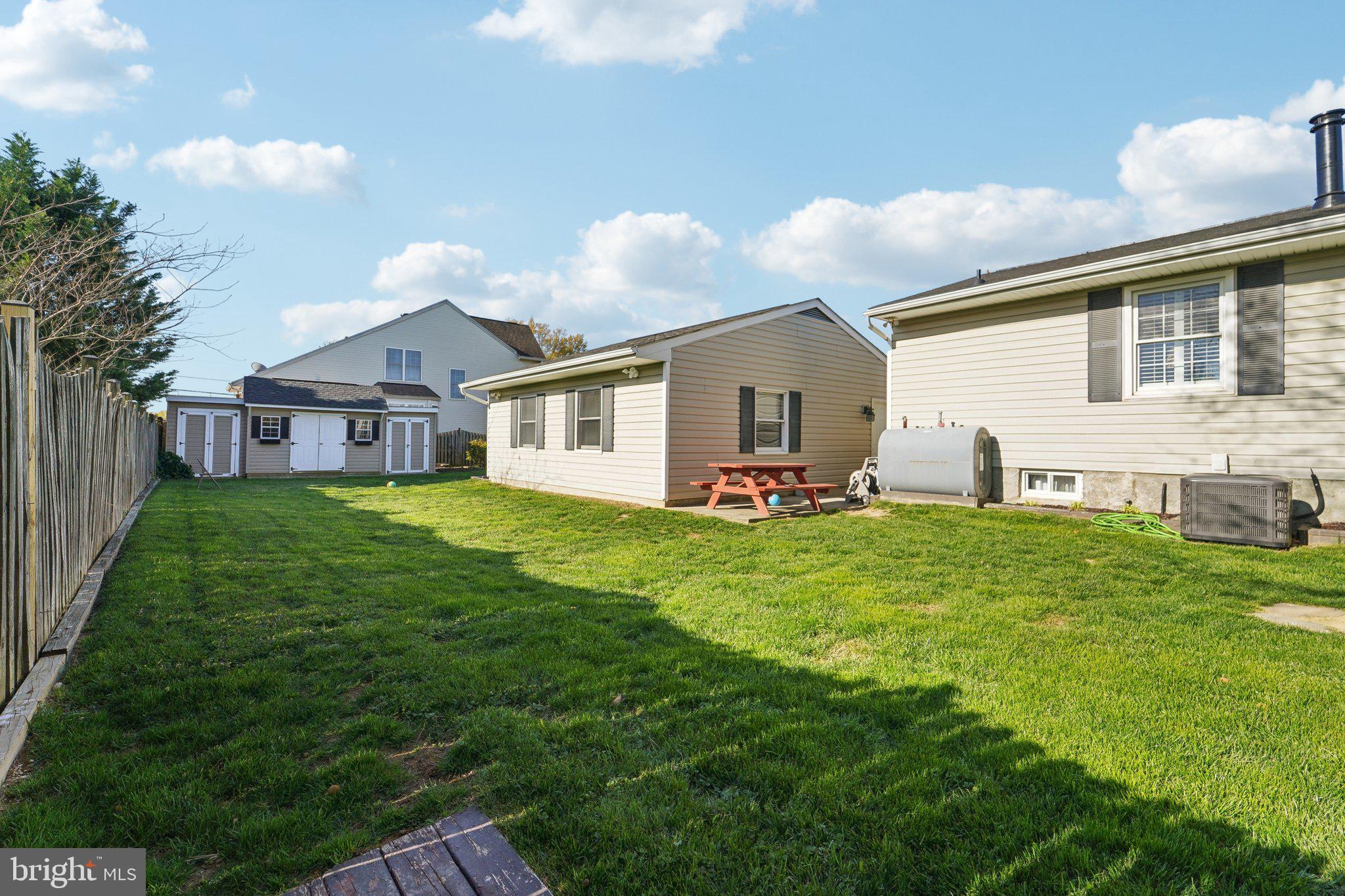 901 Mark Road Baltimore, MD 21225 - Photo 34 of 39 a front view of house with yard barbeque and outdoor seating
