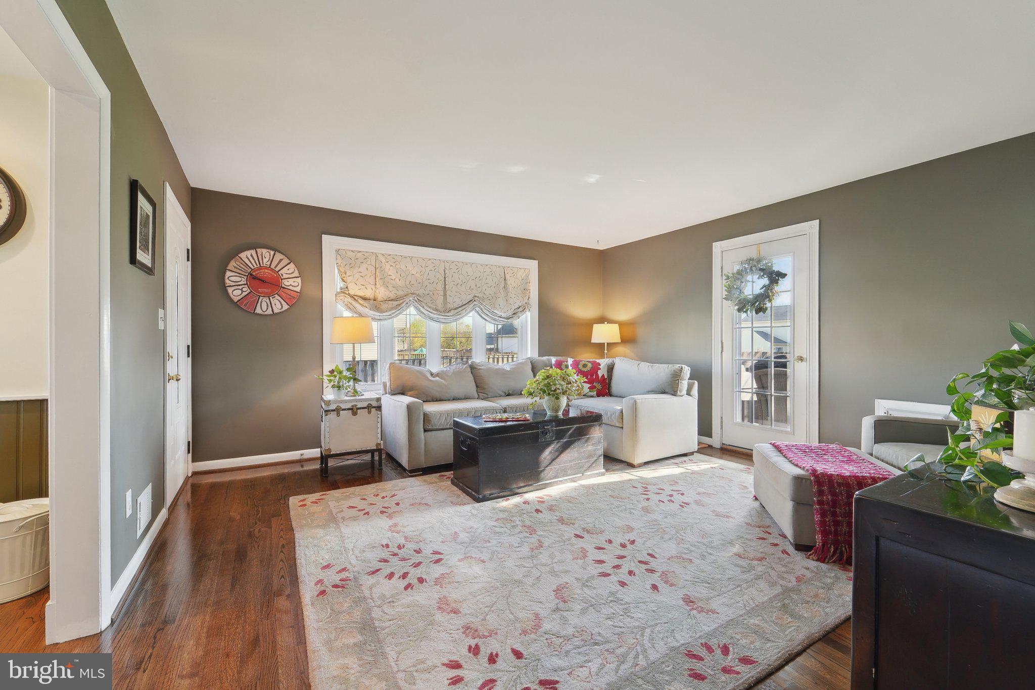 901 Mark Road Baltimore, MD 21225 - Photo 5 of 39 a living room with furniture and wooden floor
