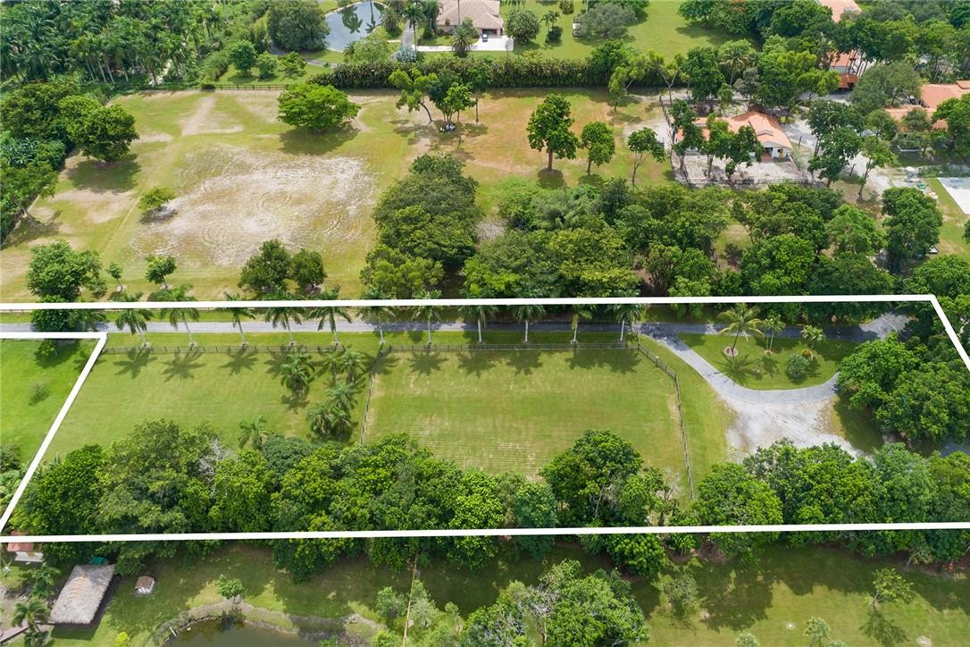 13470 Stirling Road Southwest Ranches, FL 33330 - Photo 4 of 13 a view of a tennis court