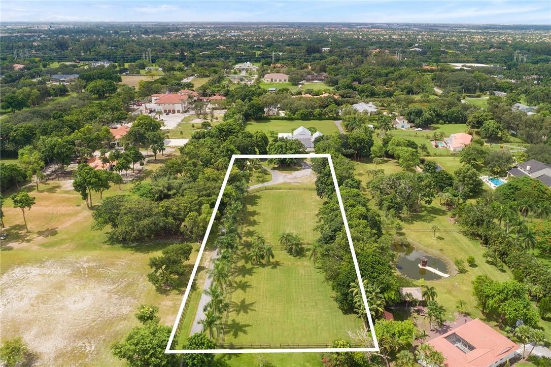 13470 Stirling Road Southwest Ranches, FL 33330 - Photo 6 of 13 an aerial view of residential houses with outdoor space