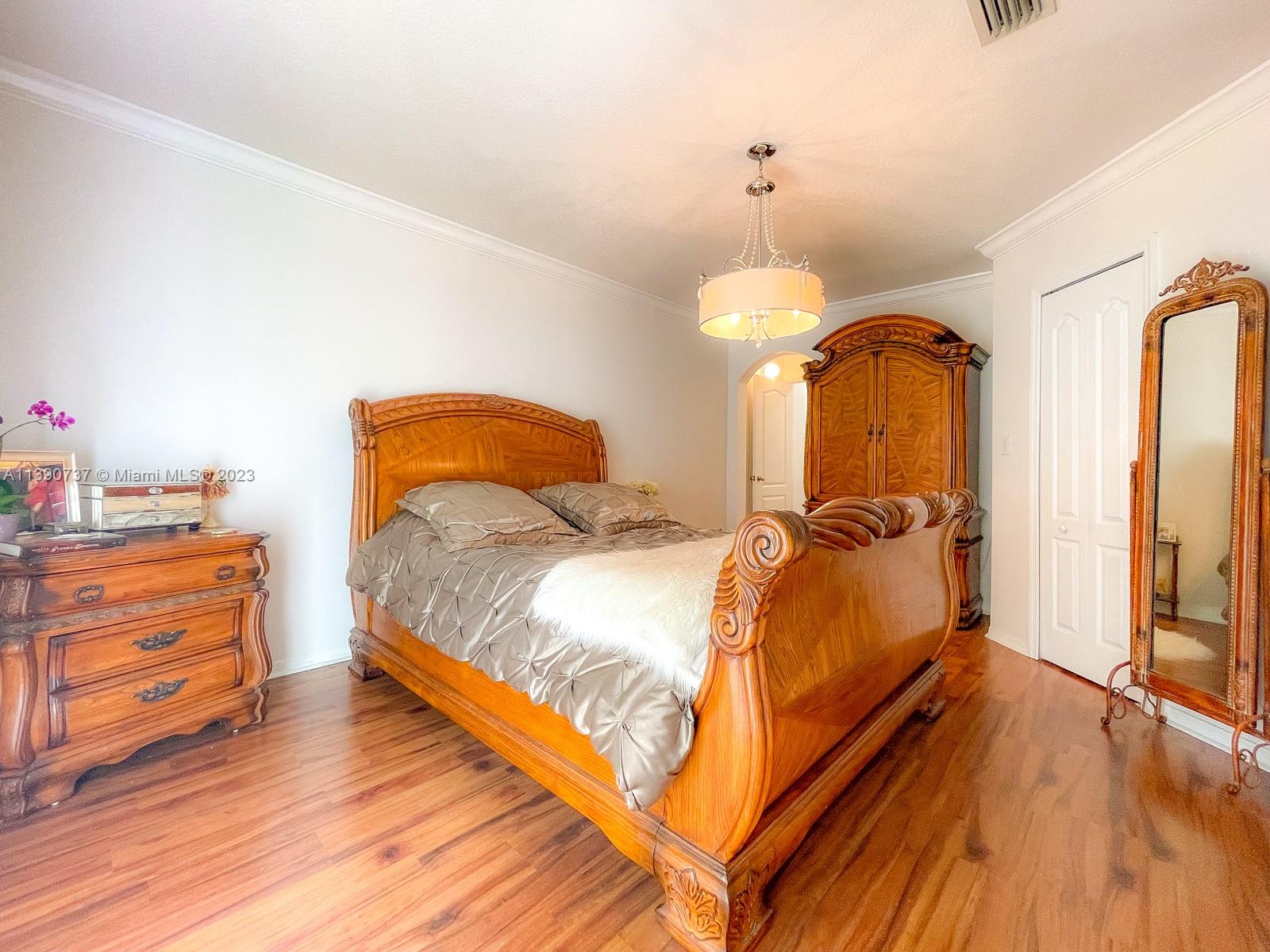 3136 Southwest 129th Way, Unit 157 Miramar, FL 33027 - Photo 12 of 23 a bedroom with bed and window