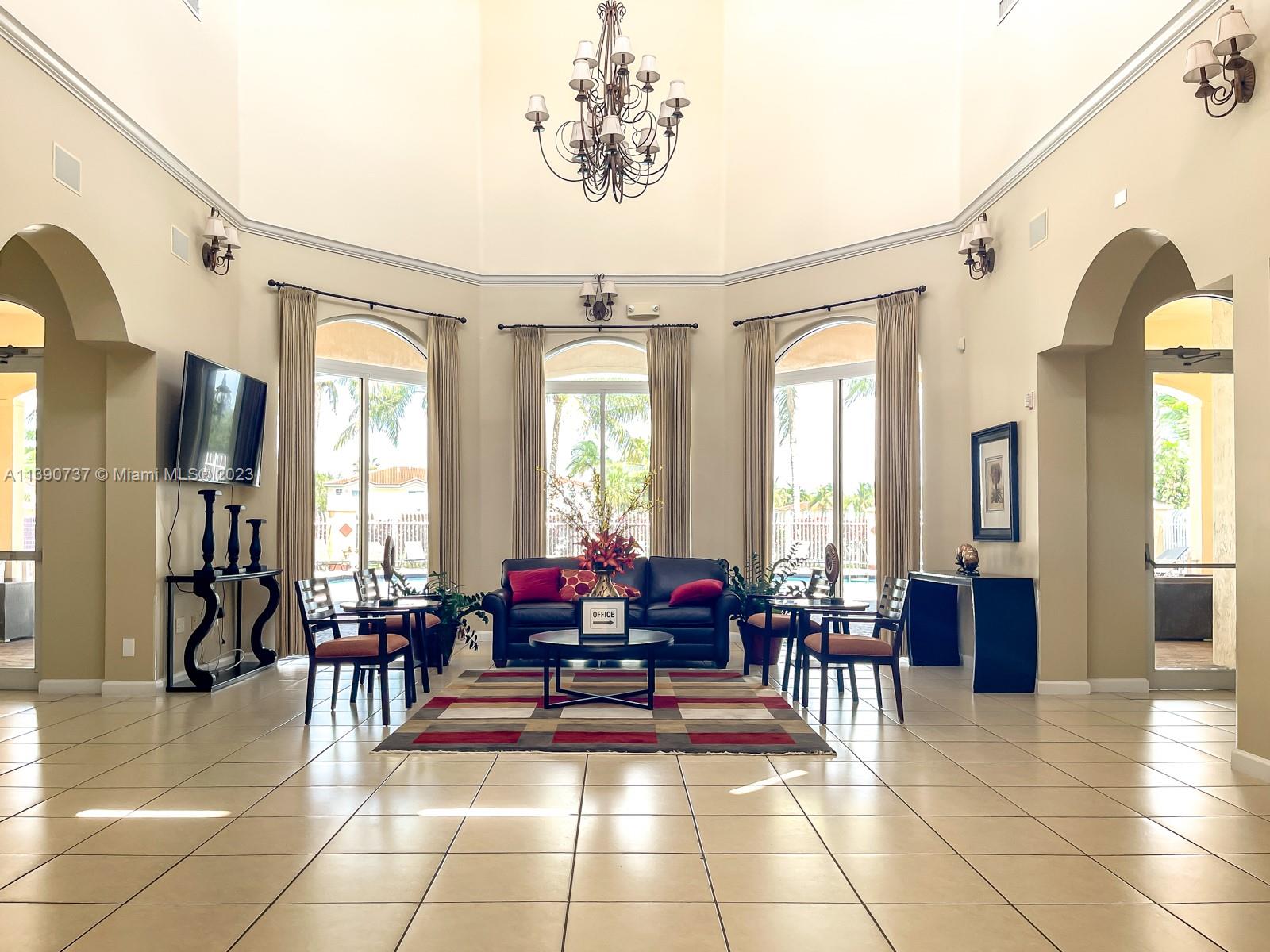 3136 Southwest 129th Way, Unit 157 Miramar, FL 33027 - Photo 21 of 23 a view of a livingroom with furniture