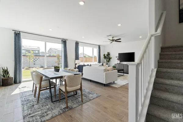 a view of a livingroom with furniture and a table