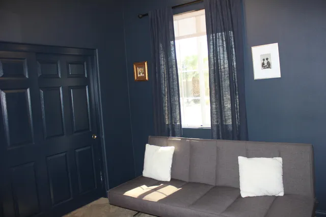 a bathroom with a sink a toilet a tub and shower