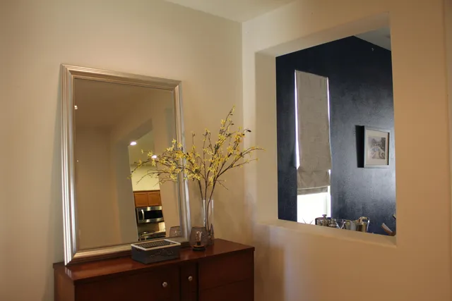 a view of a mirror with a sink