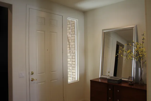 a view of a living room and dining room