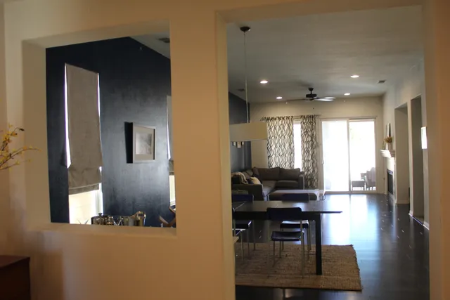 a kitchen with a sink cabinets and outdoor space