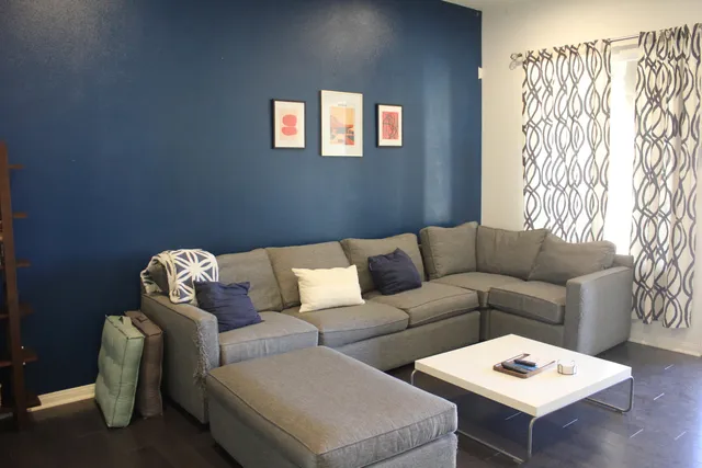 a living room with furniture and a couch