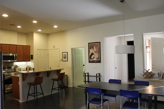 a view of a dining room with furniture