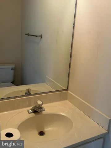 a bathroom with a sink and a shower