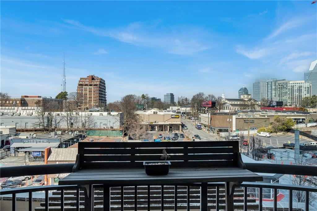 325 East Paces Ferry Road Northeast, Unit 601 Atlanta, GA 30305 - Photo 16 of 28 a view of a balcony with city view