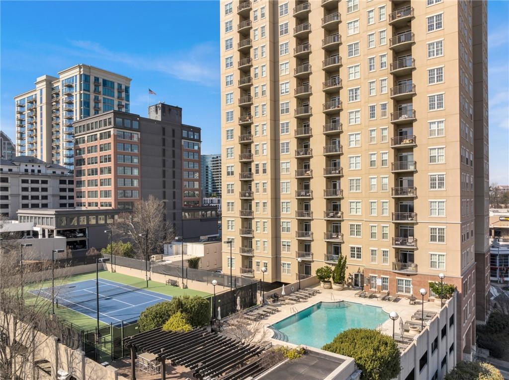 325 East Paces Ferry Road Northeast, Unit 601 Atlanta, GA 30305 - Photo 25 of 28 a view of swimming pool with outdoor seating