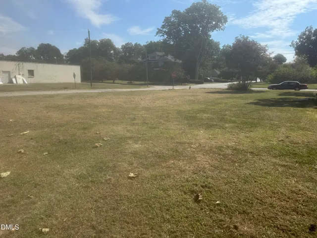 a view of a yard with an outdoor space