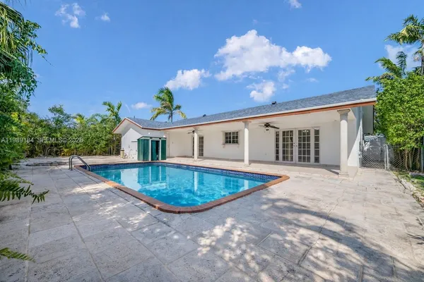 a front view of house with yard and entertaining space