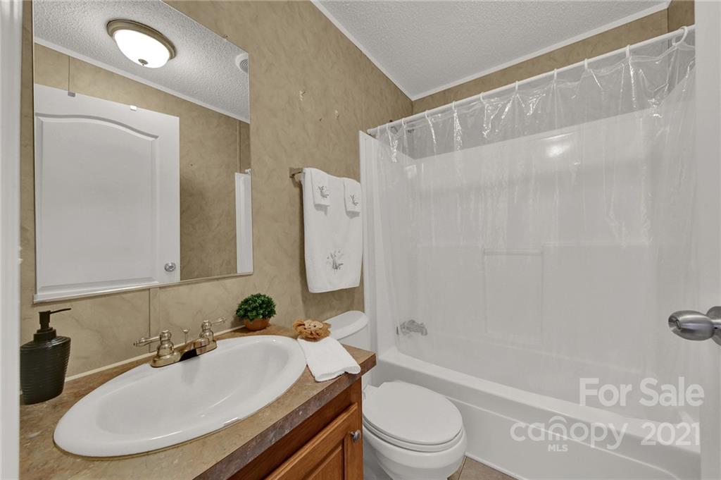 1217 Reservation Road Rock Hill, SC 29730 - Photo 22 of 32 a bathroom with a sink toilet and shower