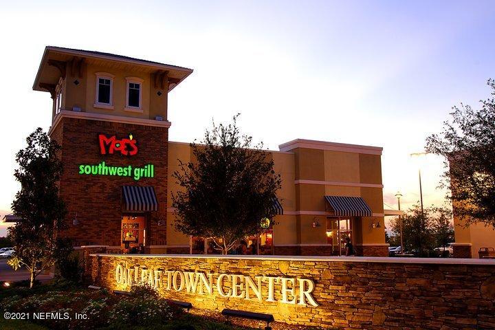 86682 Mainline Road Webster, FL 33597 - Photo 22 of 23 a front view of a house with a yard