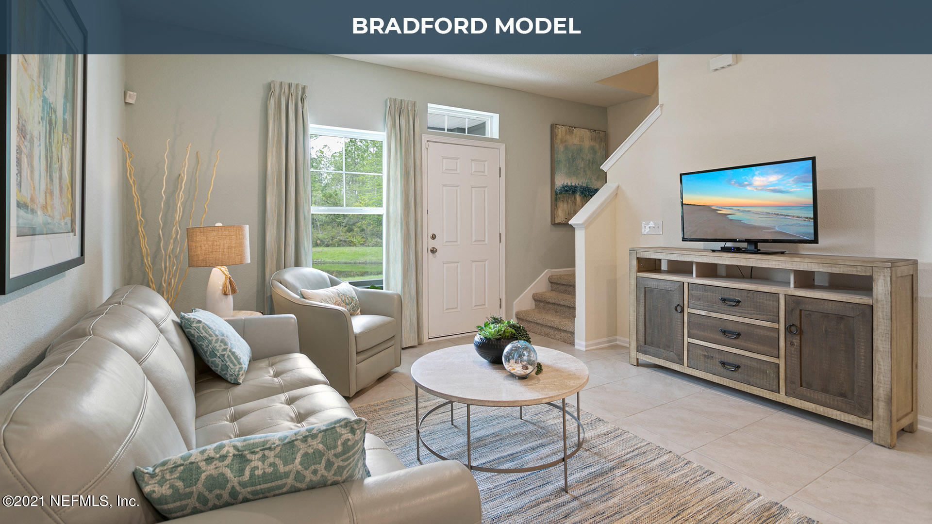86682 Mainline Road Webster, FL 33597 - Photo 7 of 23 a living room with furniture and a flat screen tv
