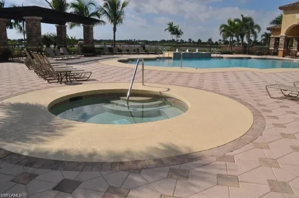 a view of a swimming pool with a lake
