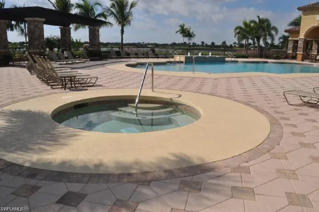 a view of a swimming pool with a lake