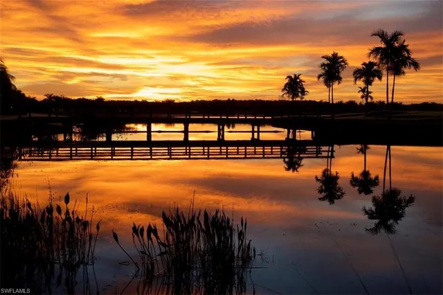 a view of swimming pool with outdoor seating