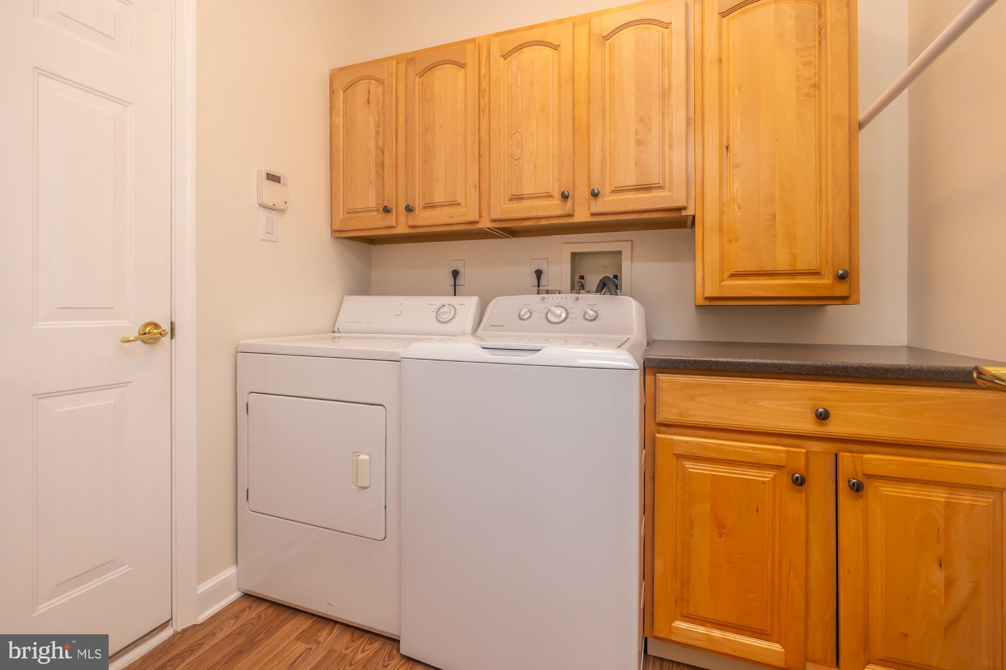 105 Hulnick Road, Unit 438 Coatesville, PA 19320 - Photo 34 of 43 Laundry room with built in cabinets