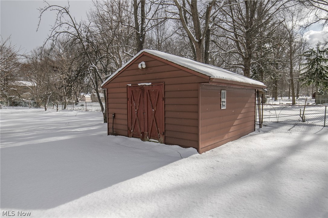 6473 Crossview Road Independence, OH 44131 - Photo 27 of 28 Storage shed/potting shed has electricity.