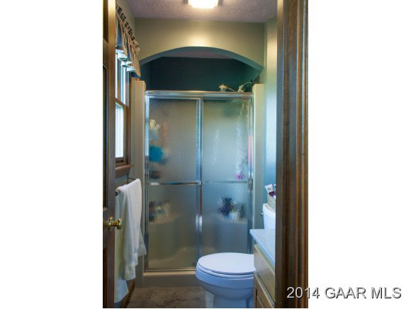 1462 Old Providence Road Raphine, VA 24472 - Photo 17 of 30 a bathroom with a toilet and a shower