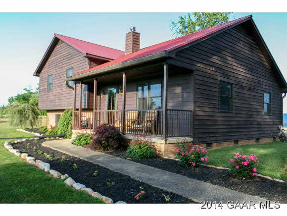 1462 Old Providence Road Raphine, VA 24472 - Photo 2 of 30 a front view of a house with a yard