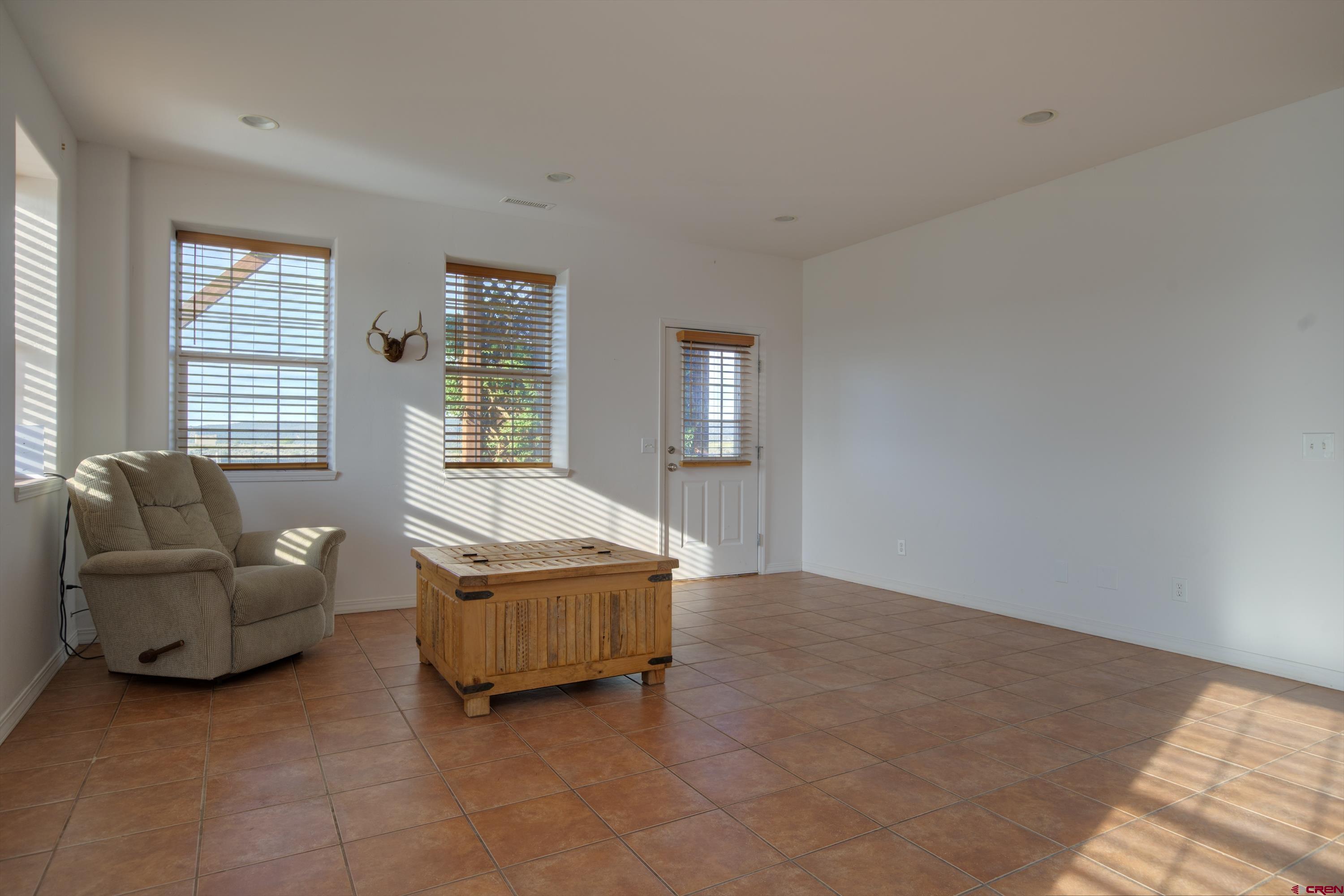 777 County Road 977 Ignacio, CO 81137 - Photo 14 of 45 a living room with furniture and windows