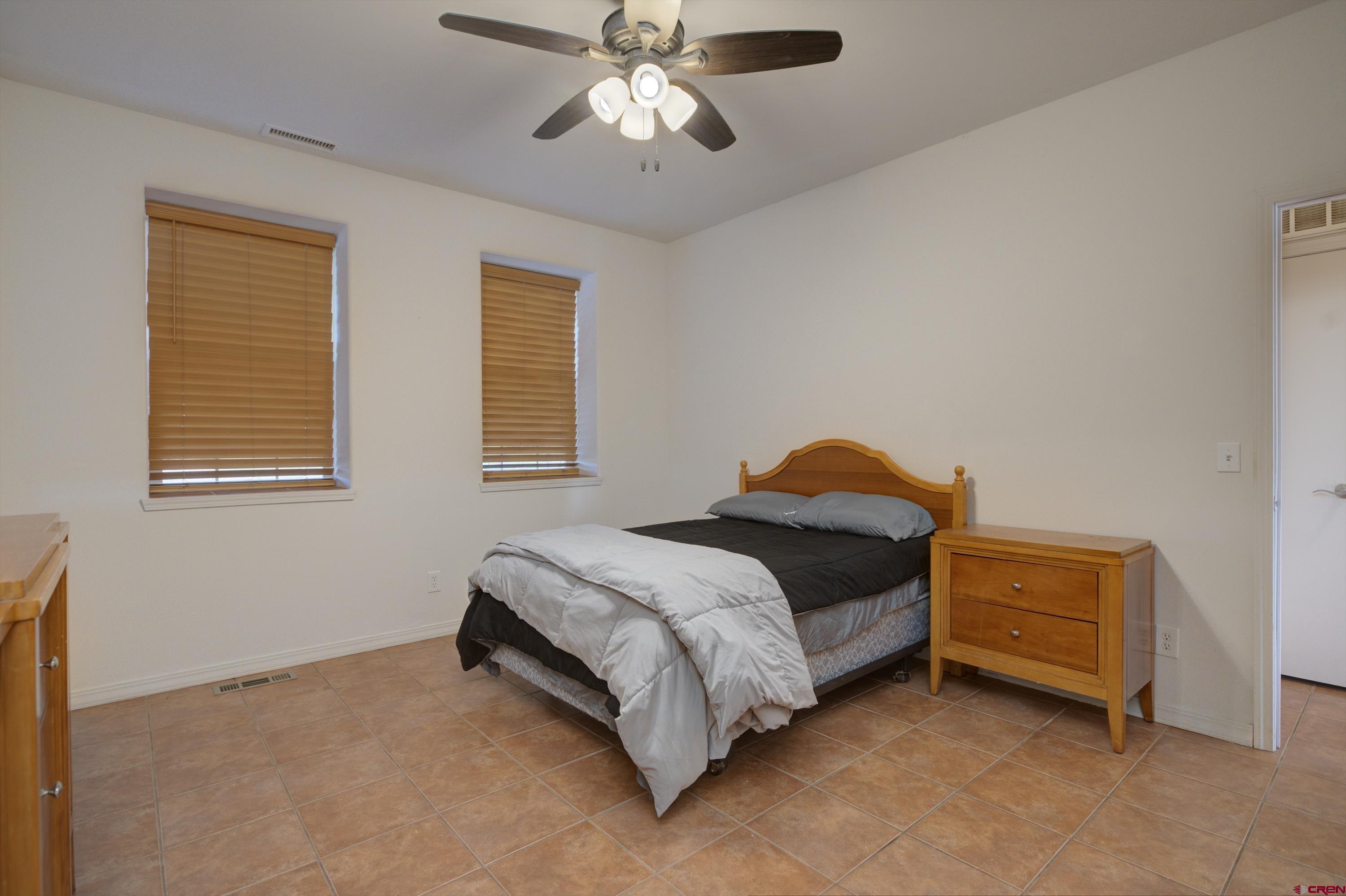 777 County Road 977 Ignacio, CO 81137 - Photo 15 of 45 a bedroom with a bed and a window