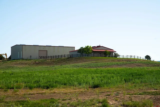 a front view of a house with glass windows