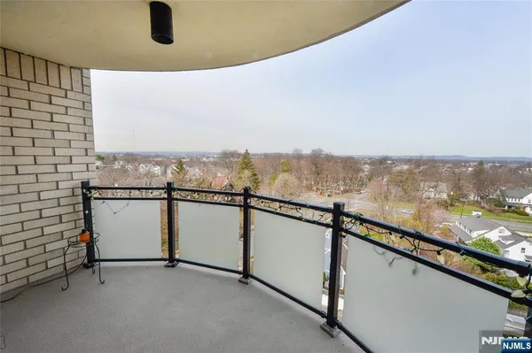 a view of balcony with furniture