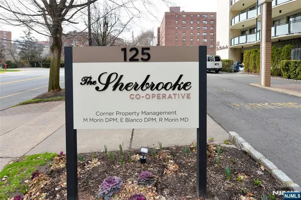 a sign on the side of a street