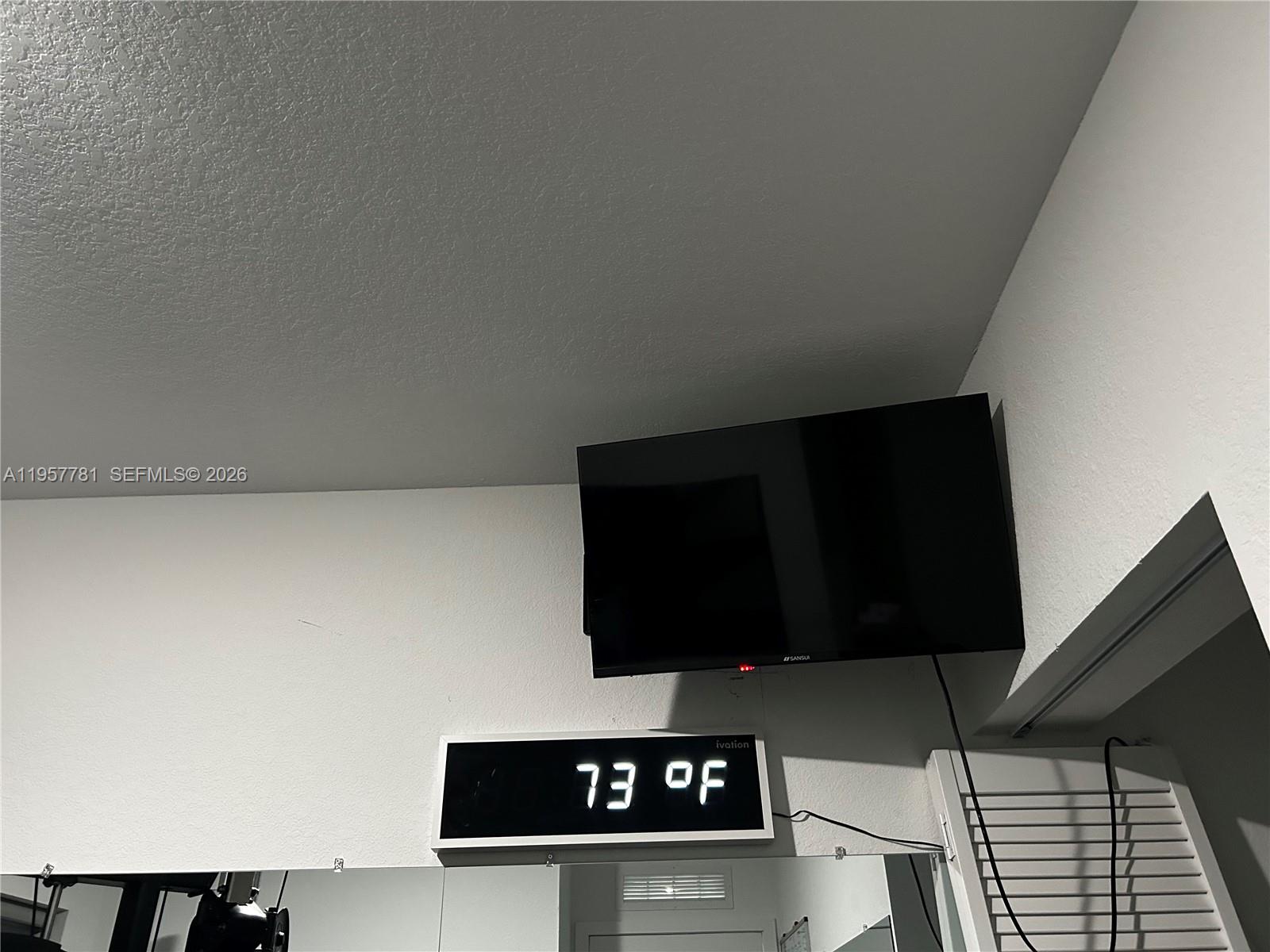 14569 Southwest 261st Terrace, Unit 14569 Homestead, FL 33032 - Photo 22 of 29 a view of wooden floor