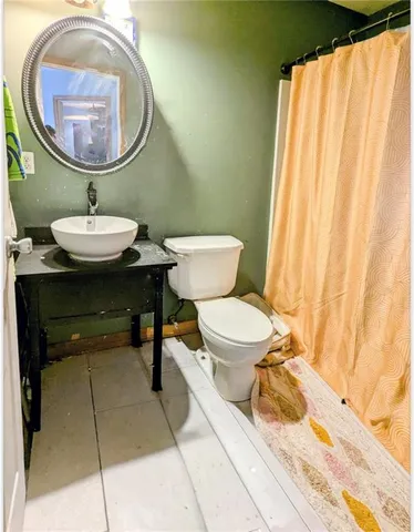 a room with musical instruments and stairs