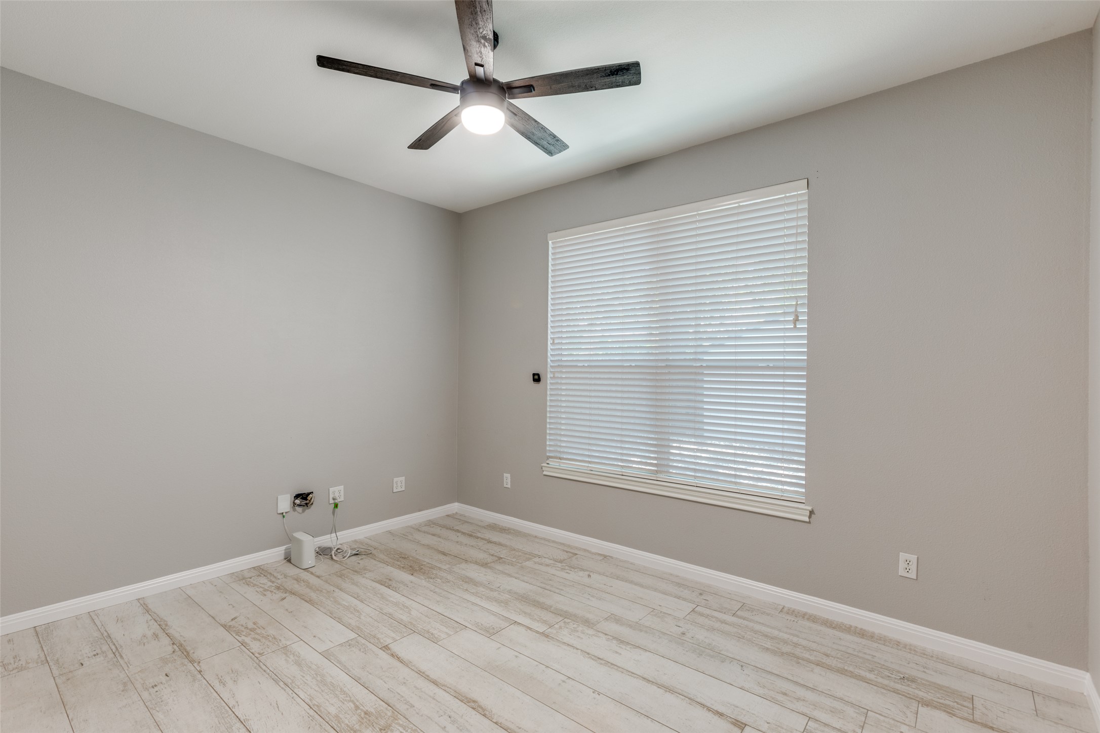3729 Galena Hills Loop Round Rock, TX 78681 - Photo 11 of 33 an empty room with a window and a ceiling fan