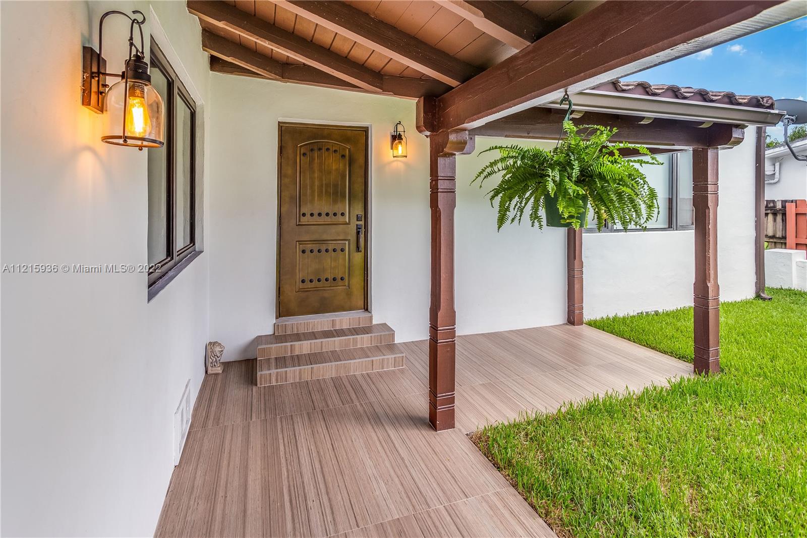 5135 Alton Road Miami Beach, FL 33140 - Photo 8 of 23 a view of front door of house