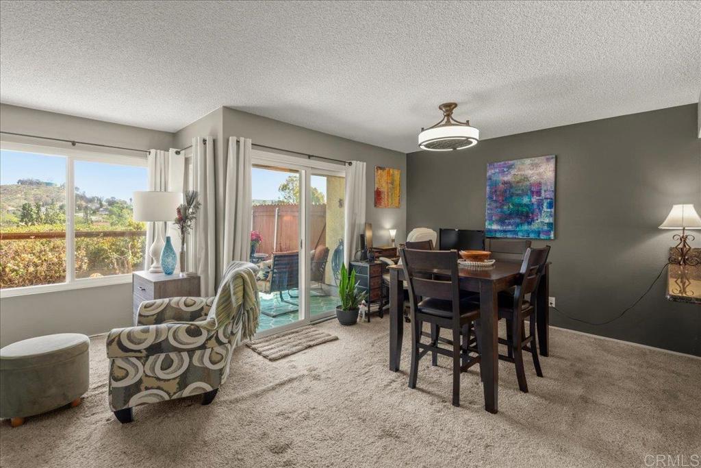 3047 Highlands Boulevard Spring Valley, CA 91977 - Photo 6 of 39 a view of a dining room with furniture window and outside view