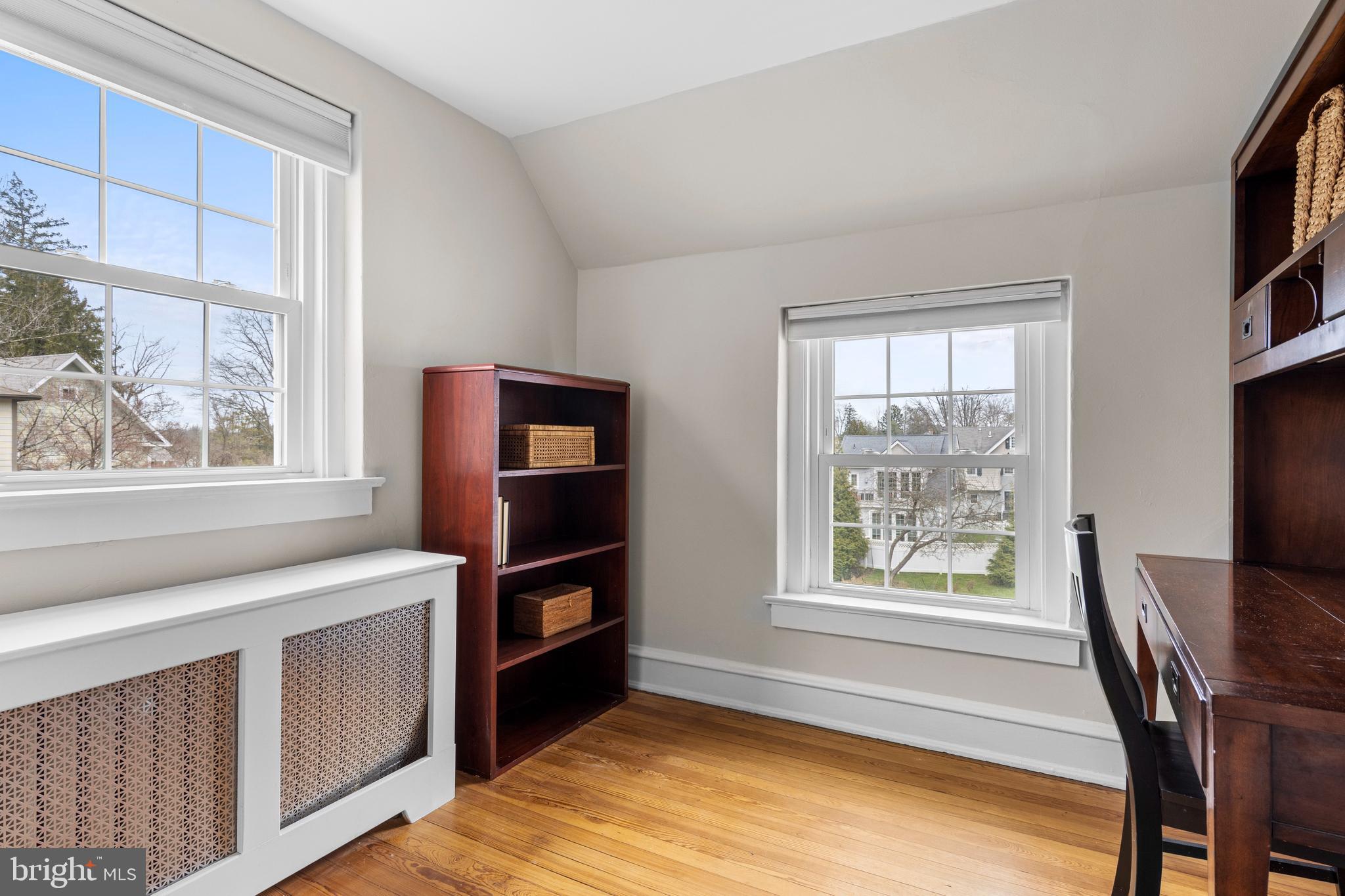 321 Conestoga Road Wayne, PA 19087 - Photo 19 of 28 a view of an empty room with furniture and a window