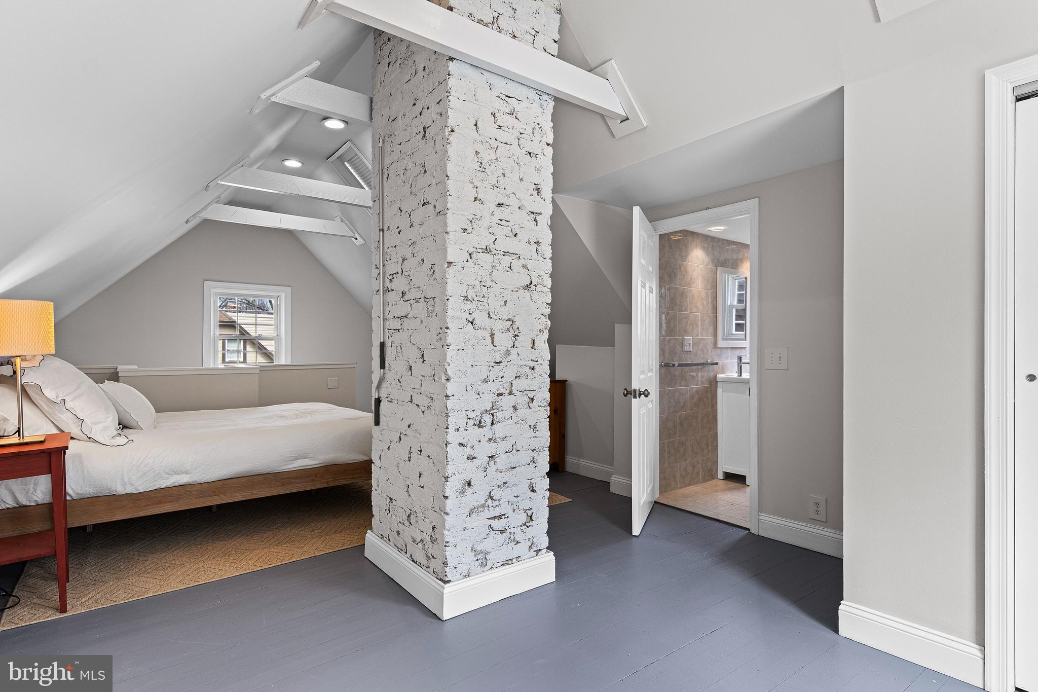 321 Conestoga Road Wayne, PA 19087 - Photo 25 of 28 a living room with furniture and a chandelier