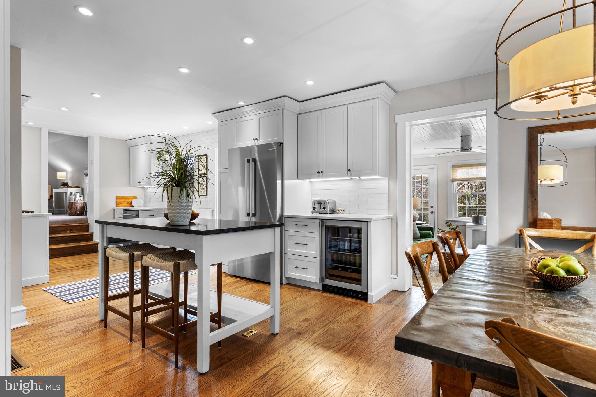 321 Conestoga Road Wayne, PA 19087 - Photo 8 of 28 a living room with fireplace furniture and a wooden floor